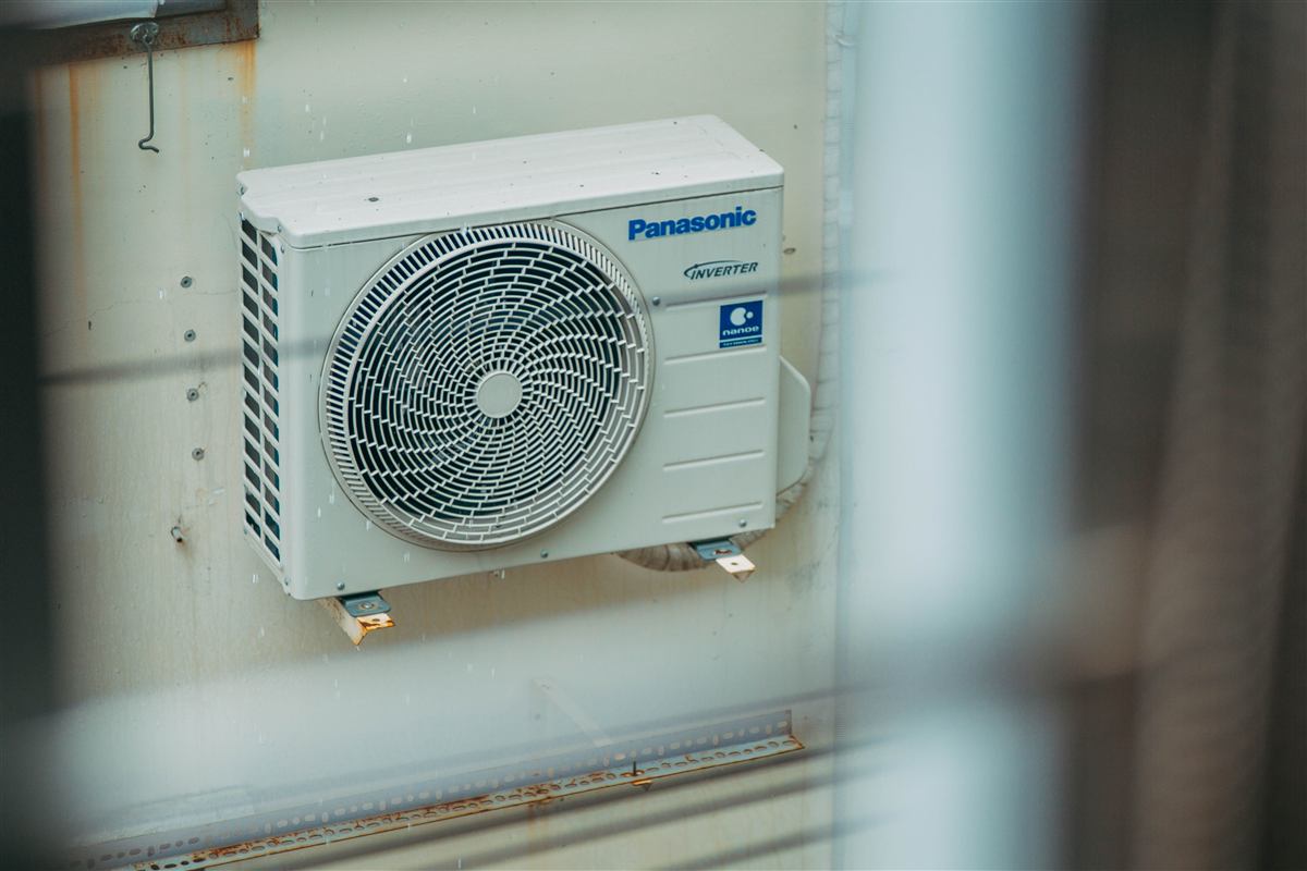 Heat pump outdoor unit running on a hot summer day